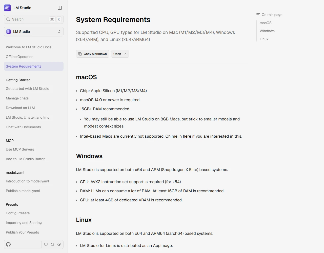 LM Studio documentation page titled System Requirements, with a macOS section asking for Apple Silicon and 16GB+ RAM, and a Windows section asking for AVX2, at least 16GB of RAM and 4GB of dedicated VRAM